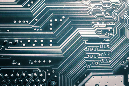 Blue electronic mother board circuit close up macro background.