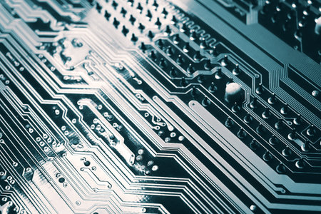 Blue electronic mother board circuit close up macro background.