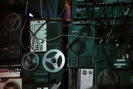 Retro old design boombox radio cassette tape recorders and audio old music player ussr. Vintage style photo background.のeditorial素材