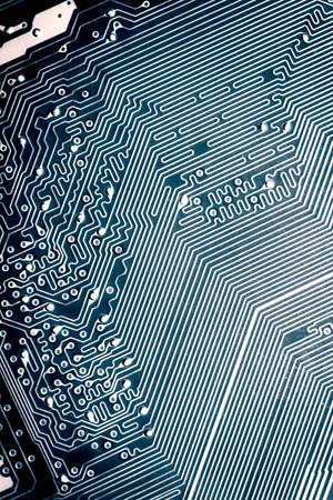 Blue electronic mother board circuit close up macro background
