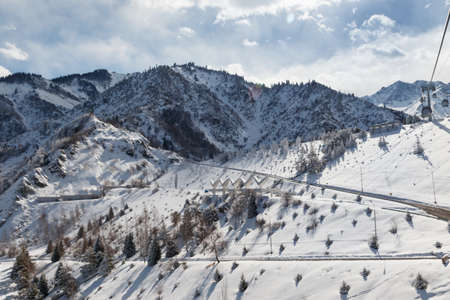 Almaty, Kazakhstan - March 16, 2021: Dam Medeo in the small Almaty gorge. Famous tourist place in Almatyのeditorial素材