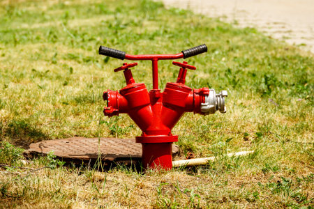 A red fire hydrant is installed in the hatch.