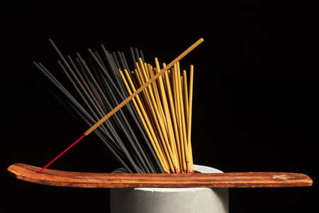 Many different incense sticks with stand ready to use.の写真素材