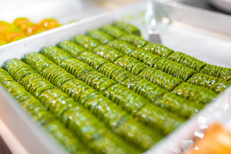 Green pistachio baklava. Close up of traditional Middle Eastern dessert.