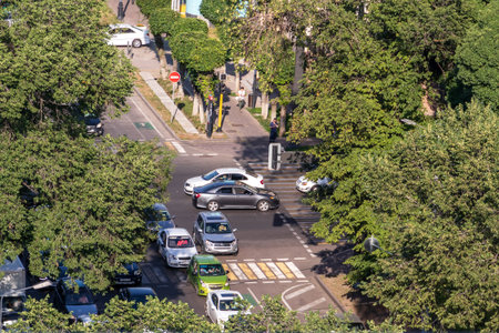 Rooftop view of a busy crossroad in city center Almaty. Almaty, Kazakhstan - July, 02, 2021