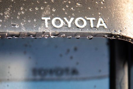 Deflector for side window of a vehicle with Toyota logo. Car accessory and additional equipment.のeditorial素材