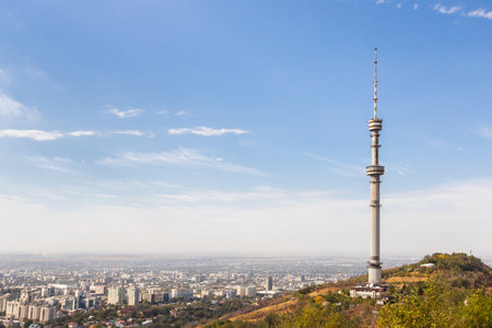 Aerial view from the Kok Tobe mountain with a TV tower to the city of Almaty in Kazakhstan. Almaty, Kazakhstan - September 28, 2022のeditorial素材