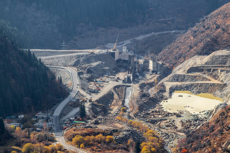Top view on construction of a mudflow protection dam in the Big Almaty Gorge in the mountains of Almaty. Almaty, Kazakhstan - October 25, 2022のeditorial素材