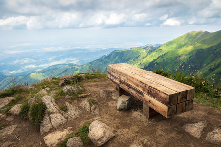 A bench for a halt on Furmanov peak in the Almaty mountains.