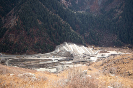 Top view on erection of a mudflow protection dam in the Big Almaty Gorge in the mountains of Almaty....