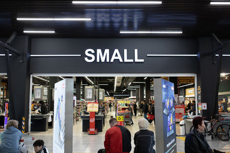 Entrance to the supermarket of the Kazakhstan brand SMALL. Almaty, Kazakhstan - April 16, 2023のeditorial素材