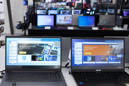 Lots of laptops in a big electronics store. Almaty, Kazakhstan - April 16, 2023