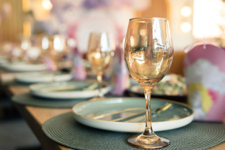 Table setting in a restaurant in rose gold warm colors.