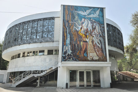 Monumental mosaic in the Kazakh national style on the rear facade of the Almaty Wedding Palace Zhas Otau. Almaty, Kazakhstan - May 08, 2023のeditorial素材