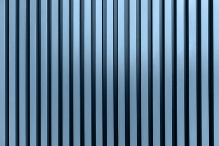 Modern stripped metal industrial blue background.の写真素材