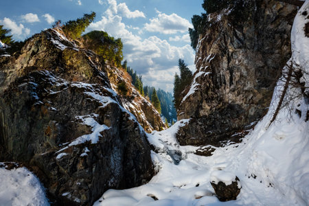 Winter Ayusai waterfall 2 in Bear gorge of Almaty mountains, ile alatau national nature park, picturesque nature of Kazakhstan.の写真素材