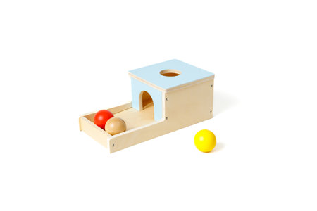 Educational logic colorful toy box with wooden balls isolated on white background.の写真素材