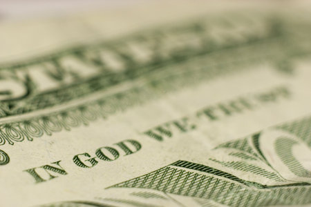Macro shot of IN GOD WE TRUST, fine focus on GODの写真素材