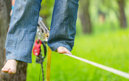 Slacklining in the summer park