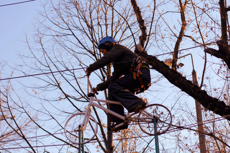 Happy woman enjoying activity in a  rope park