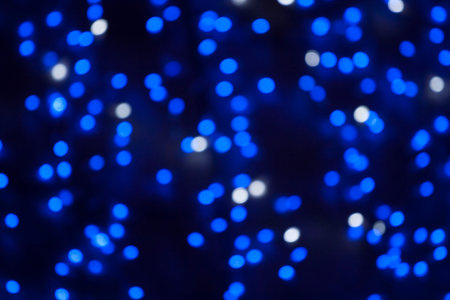 Blurred glittering christmas lights. Blurred abstract background