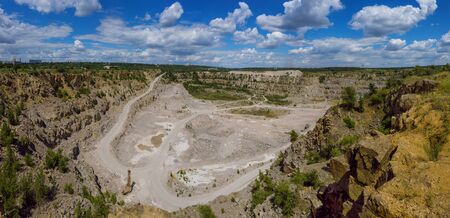 panoramic view of granite stone extraction in the quarryの写真素材