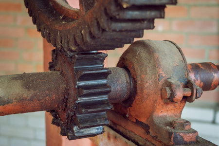 close-up of old rusty gears hoisting mechanismの写真素材