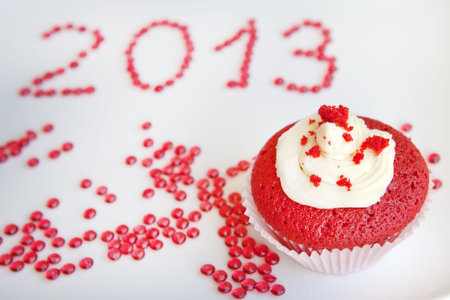 Fresh baked red velvet cupcake for new year party 2013