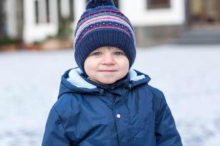 Portrait of cute toddler boy smiling on beautiful  dayの写真素材
