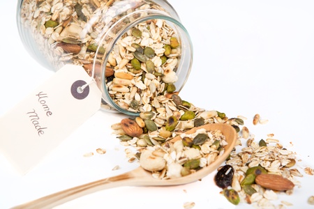 Homemade healthy granola with different nuts and oatsの写真素材