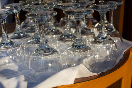 Empty wine glasses on a table in a restaurant