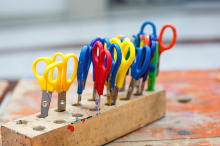 Colorful scissors for children for making art, closeup