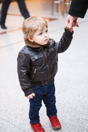 Little toddler boy of two years in a shopping mallの写真素材