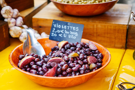 Different marinated olives on provencal street market in Provence, Franceの写真素材