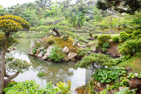 Shukkeien is a pleasant Japanese style garden in Hiroshima, Japan.の写真素材