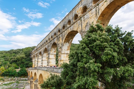 Pont du Gard is an old Roman aqueduct near Nimes in Southern France. Travel destination for tourists in Provence.の写真素材