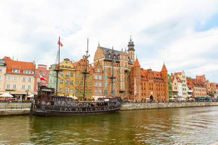 Colorful cityscape of Gdansk in Poland. Beautiful part of polish old city with houses and churches.