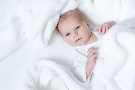 Portrait of cute adorable newborn baby childの写真素材
