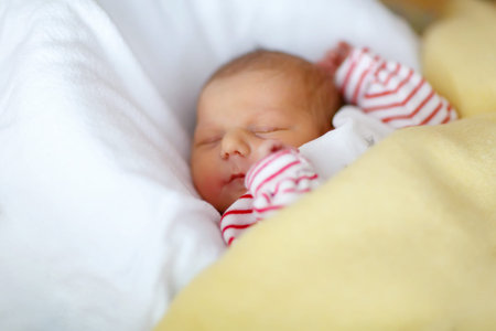 Portrait of cute adorable newborn baby girl sleeping