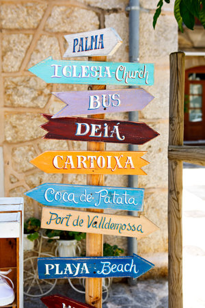 Beautiful street in Valldemossa with traditional flower decoration, famous old mediterranean village...