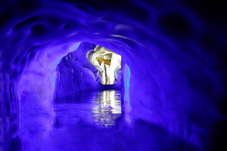 Cross inside the Natural Ice Palace (Ice Cave) at the top of Hintertux Glacier., Austria.の写真素材