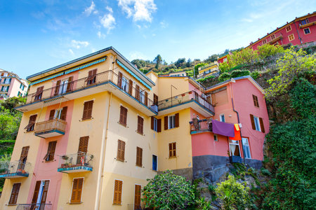 Riomaggiore, Liguria, Italy fisherman village, colorful houses on sunny warm day. Monterosso al Mare, Vernazza, Corniglia, Manarola, and Riomaggiore, Cinque Terre National Parkの写真素材