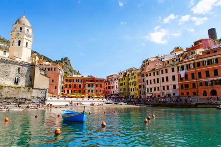 Liguria, Italy coastline of Riviera with colorful houses on sunny warm day. Monterosso al Mare, Vernazza, Corniglia, Manarola and Riomaggiore, Cinque Terre National Park UNESCO World Heritageの写真素材