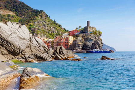 Liguria, Italy coastline of Riviera with colorful houses on sunny warm day. Monterosso al Mare,...