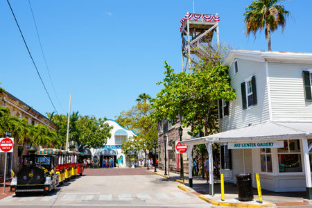 KEY WEST, FLORIDA USA - APRIL 13, 2016: The historic and popular center and Duval Street in downtown Key West. Beautiful small town in Florida, United States of Americaのeditorial素材