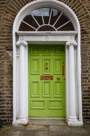 Colorful georgian doors in Dublin, Ireland. Historic doors in different colors painted as protest against English King George legal reign over the city of Dublin in Ireland.の写真素材