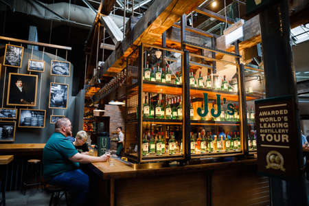 DUBLIN, IRELAND - JULY 2, 2019: Interior and bar of Old Jameson Distillery, Smithfield Square in Dublin, Ireland. The original site where Jameson Irish Whiskey was distilled until 1971のeditorial素材