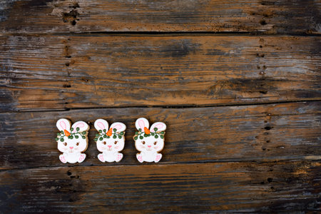 Closeup of variation of different Easter sugar cookies decorated with royal icing. Bunny rabbit with...