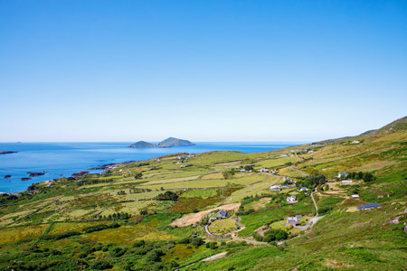 Landscape of beach, hills and atlantic ocean of beautiful Ring of Kerry, Ireland. Travel destination for many touristsの写真素材