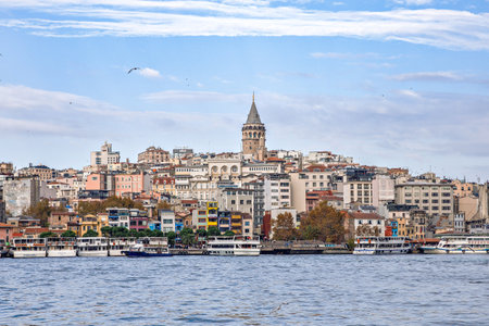 ISTANBUL, TURKEY - NOVEMBER 18, 2022. Galata Tower rises above city, Istanbul, Turkey. It is old landmark of Istanbul. Nice view of historical district of Istanbul.のeditorial素材